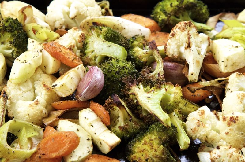 Roasted vegetables for roasted vegetable pasta bake, including broccoli, cauliflower and carrots.