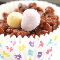 Chocolate crispie cake, topped with chocolate eggs in a paper cup.