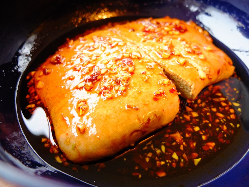 Homemade tofu marinaded in honey, chilli, tamari and garlic.