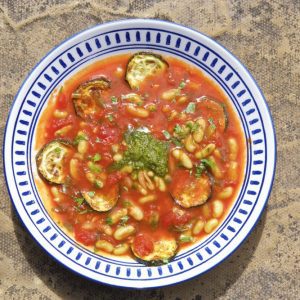 A bowl of courgette soup to illustrate a roast courgette and tomato soup recipe