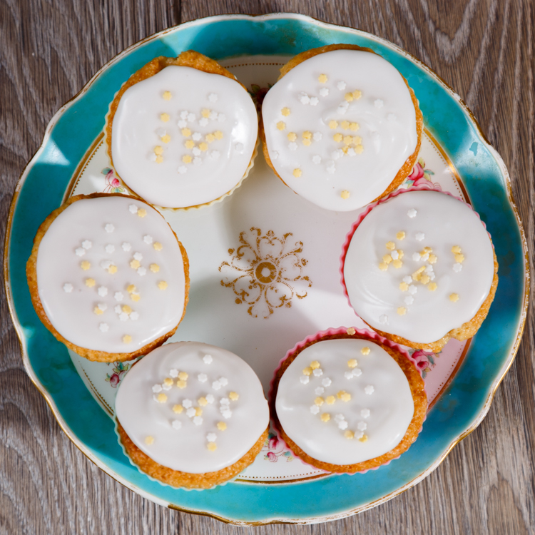 Vegan Lemon Cupcakes on a decorative plate.